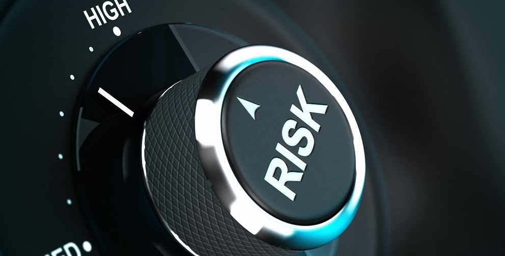 Button with the word risk pointing between medium and high level, 3D render suitable for risk management or decision-making process situation. Depth of field.